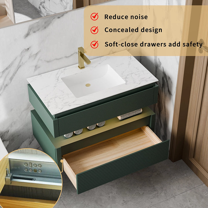 Green bathroom vanity with soft close drawers and concealed design