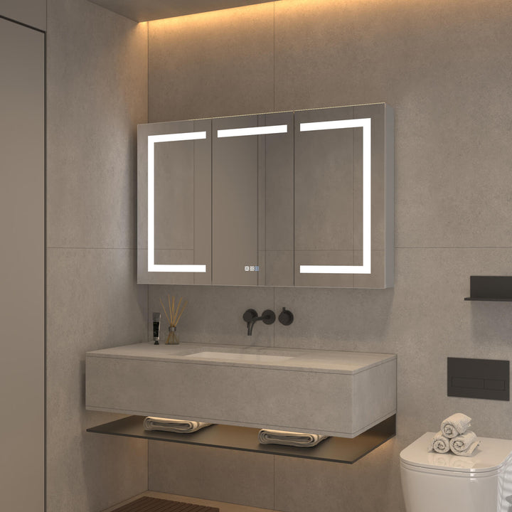 Sleek bathroom with LED mirror cabinet and floating vanity design