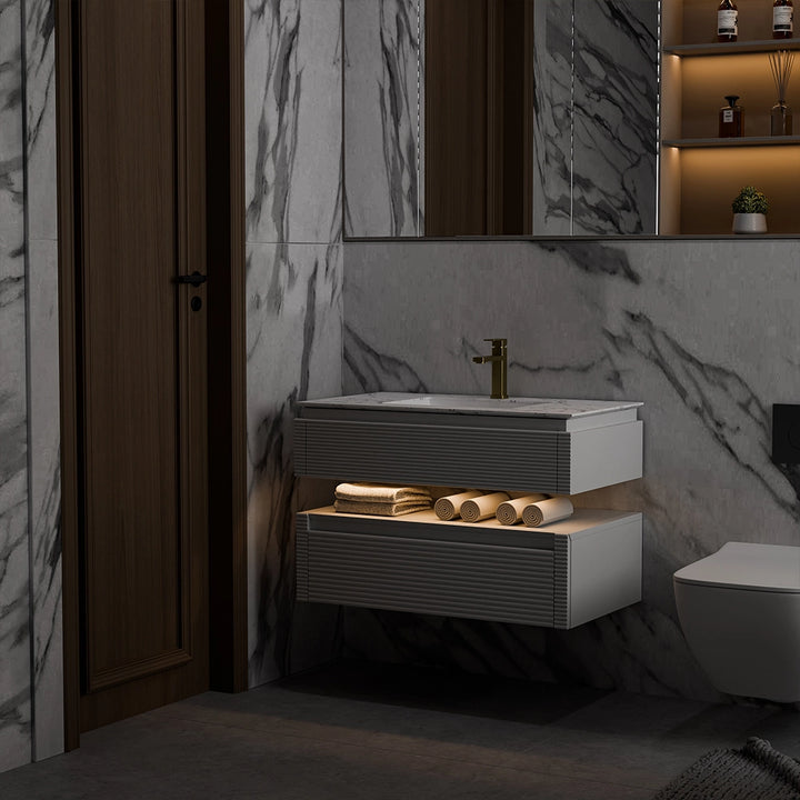 Wall mounted white bathroom vanity with LED under cabinet lighting