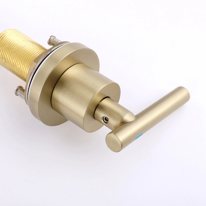 Brushed gold widespread faucet handle and cartridge detail