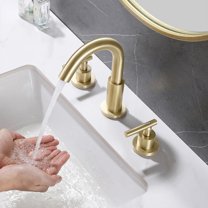Brushed gold widespread faucet with running water handwashing