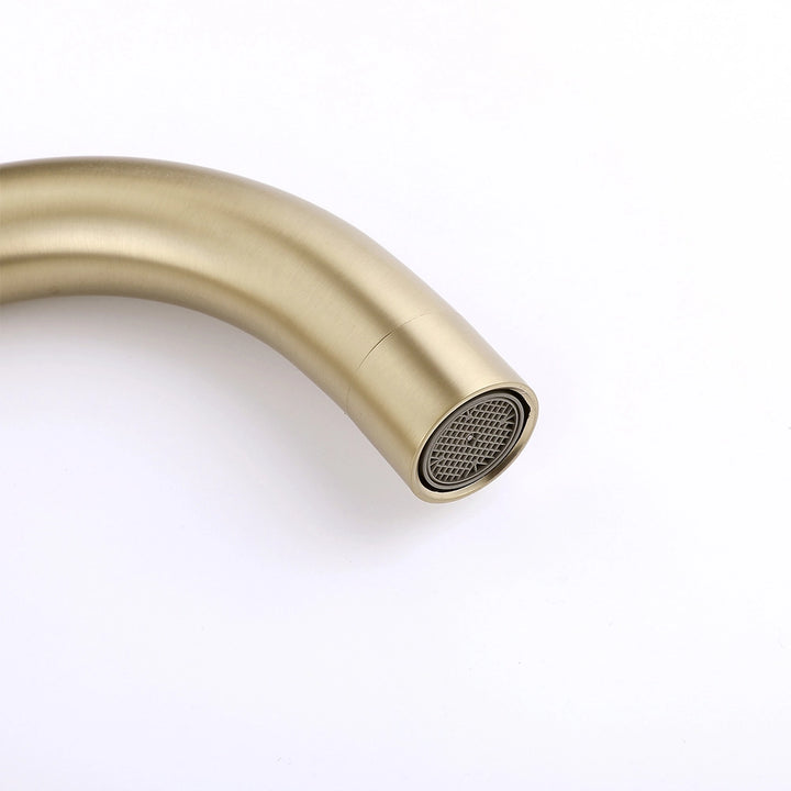 Brushed gold widespread faucet spout with aerator detail