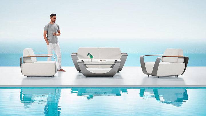 Modern aluminum outdoor conversation set for 4 with chairs and loveseat by the pool