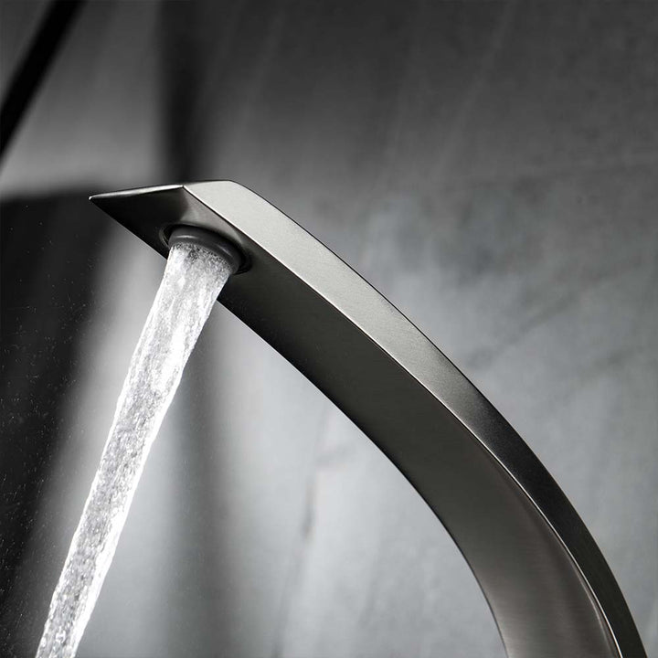 Brushed nickel bathroom faucet water flow detail modern