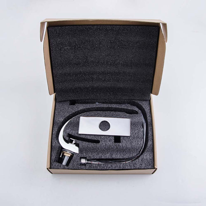 Chrome bathroom faucet with packaging box and accessories