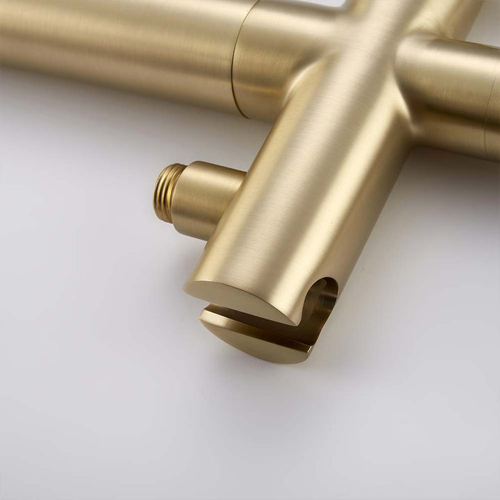 Close-up of gold bathtub faucet connector detail