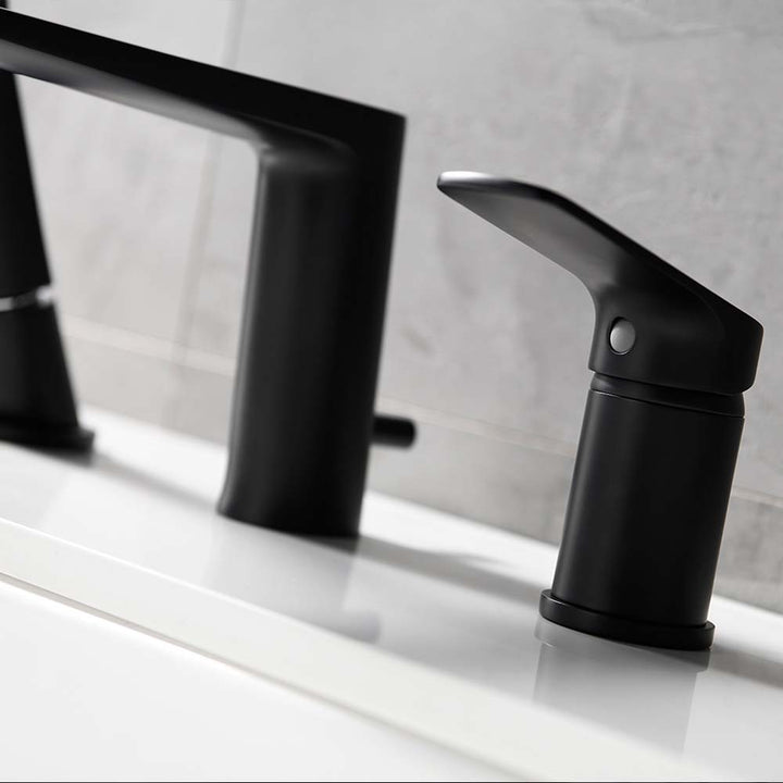 Close-up of modern black bathtub faucet handle design