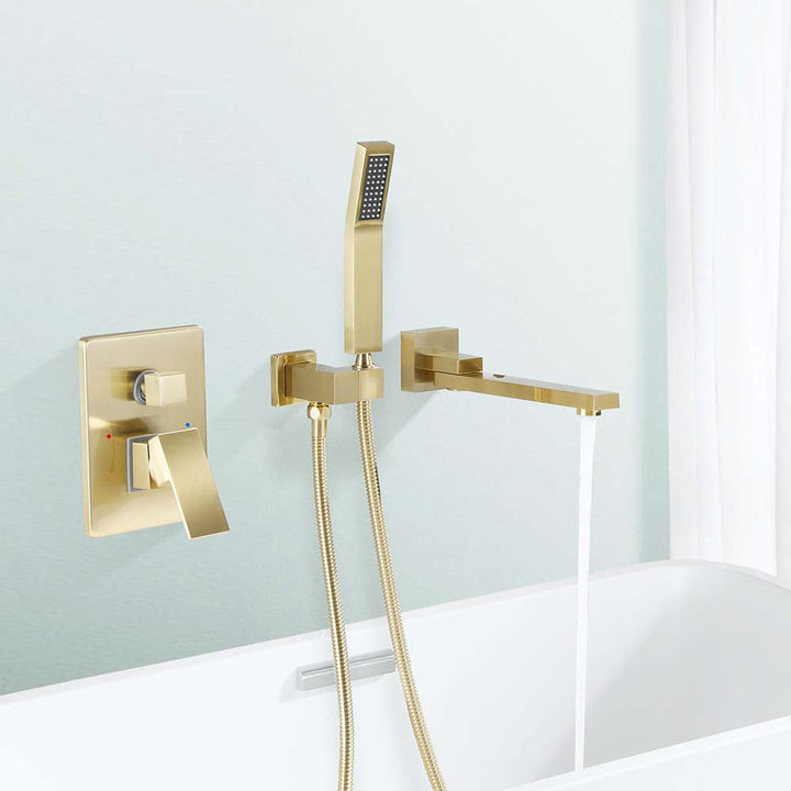 Wall-mounted gold bathtub faucet running water into tub