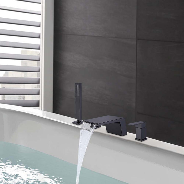 Bathtub faucet with waterfall spout and hand shower running water