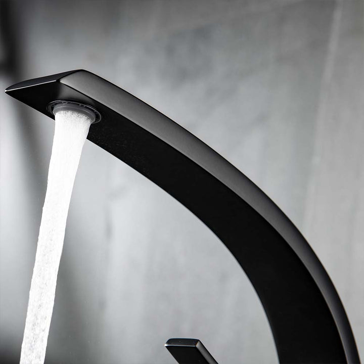 Black bathroom faucet with smooth water flow detail