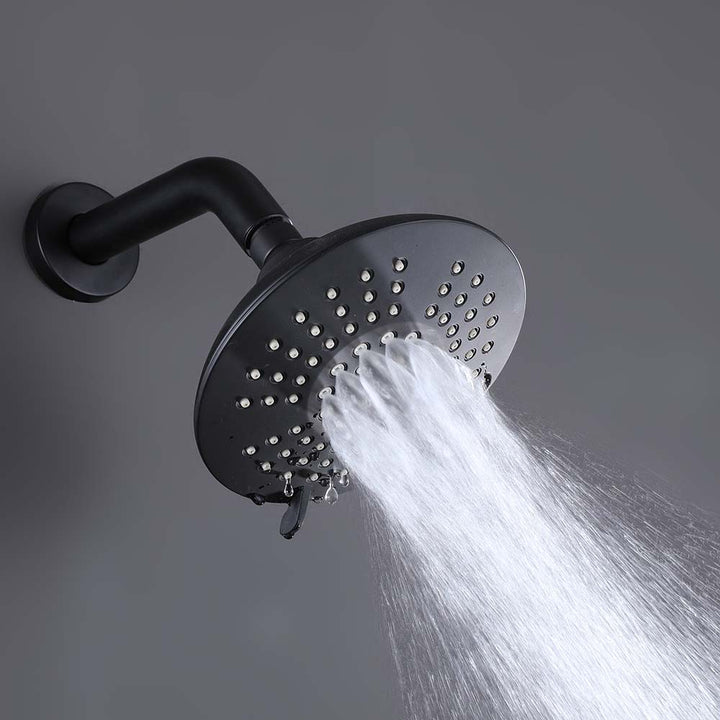 Black shower system with massage spray water mode on gray background