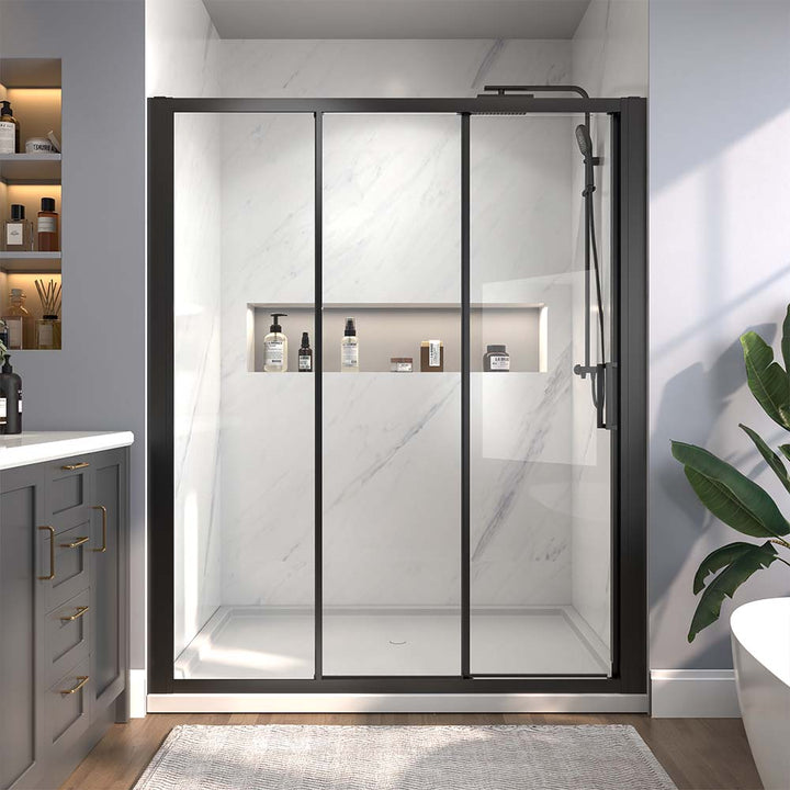 Black sliding shower door with modern design and clear glass.