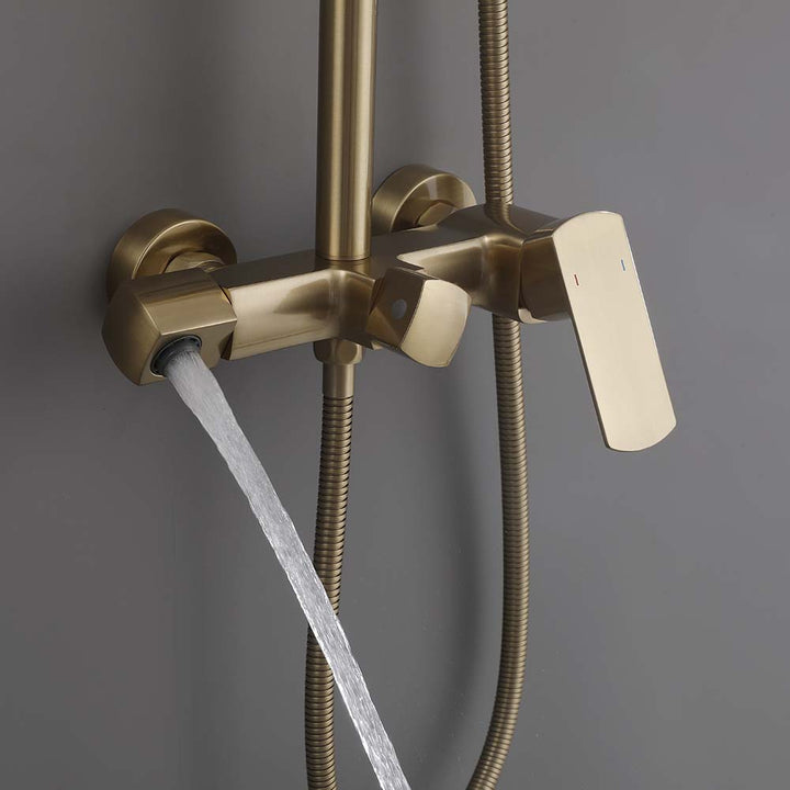 Shower valve with brushed gold finish and running water