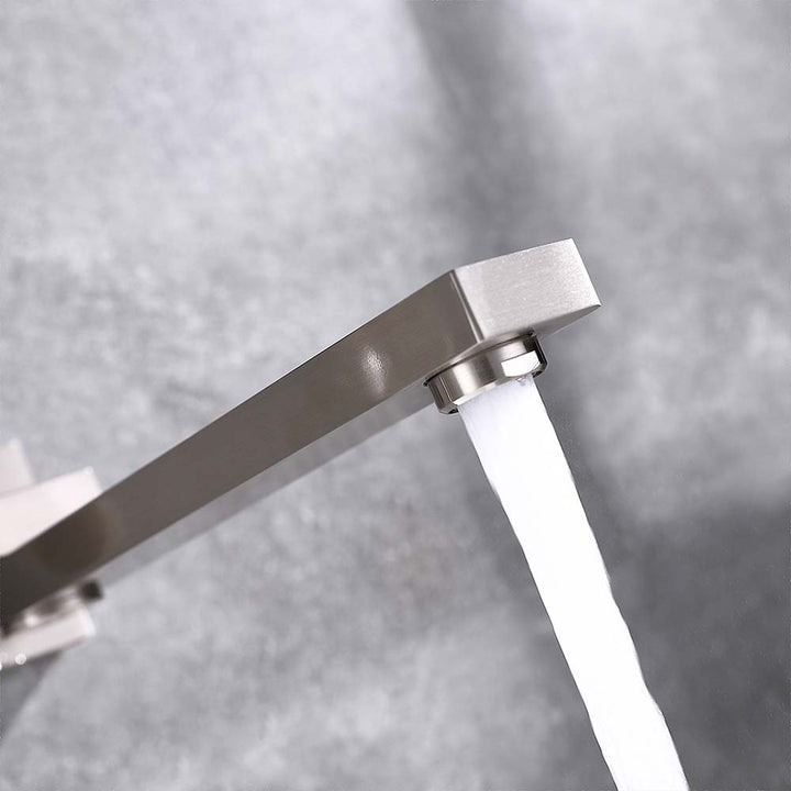 Brushed nickel bathtub faucet spout with running water
