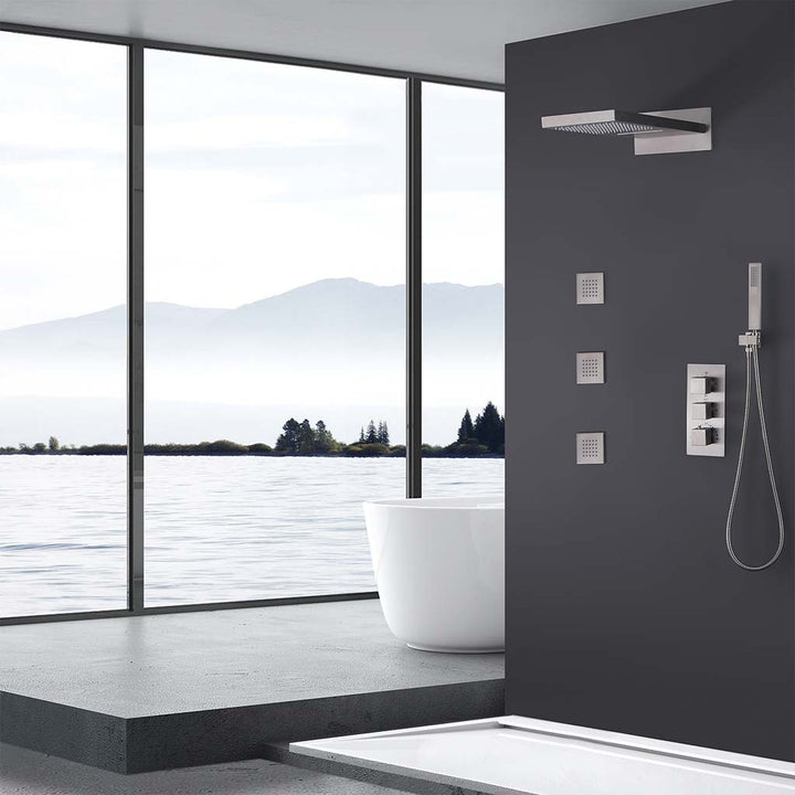 Brushed nickel wall mounted shower system with body jets and handheld