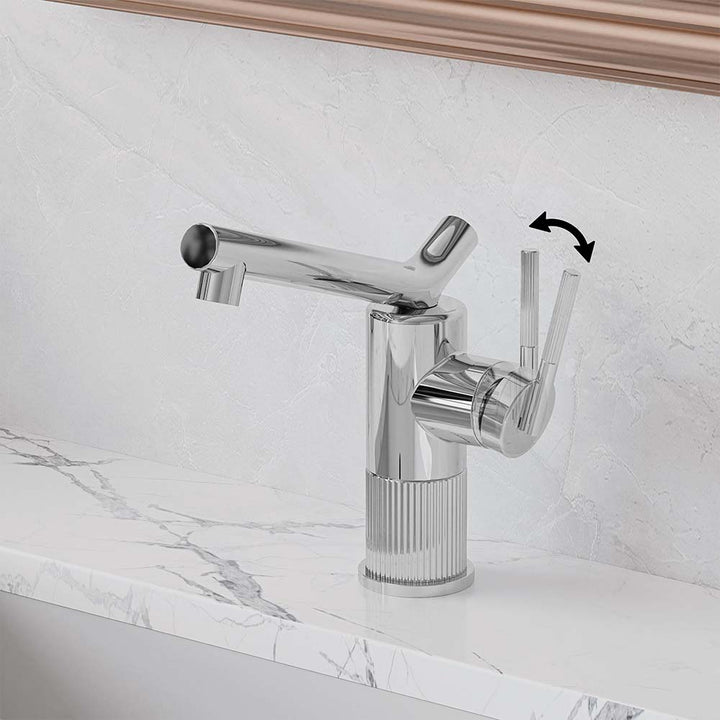 Chrome bathroom faucet with handle control direction shown