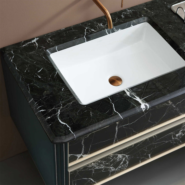 Custom black marble bathroom vanity with integrated sink top