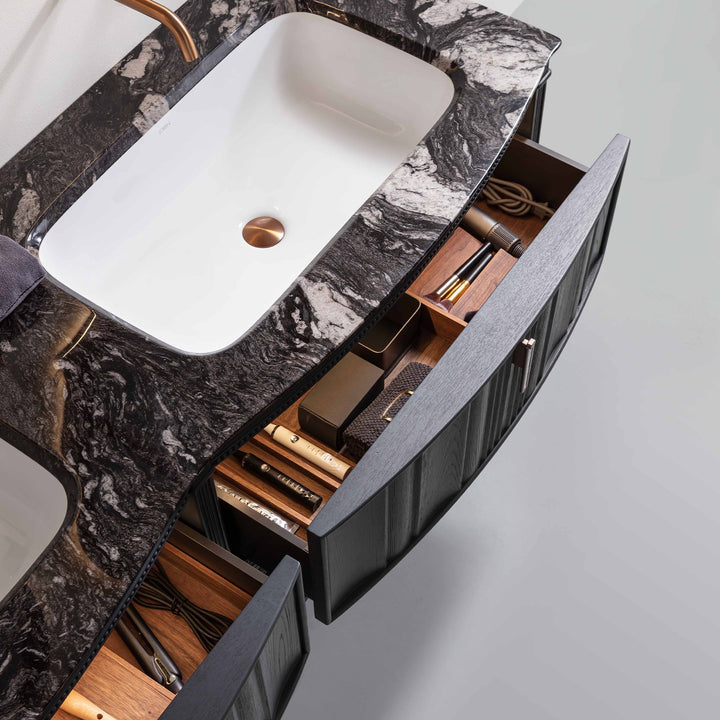 Custom bathroom vanity with black marble top and drawer storage
