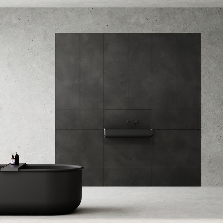 Minimalist dark gray custom bathroom vanity and matte black bathtub scene