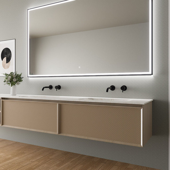 Custom bathroom vanity with double sinks and large LED illuminated mirror