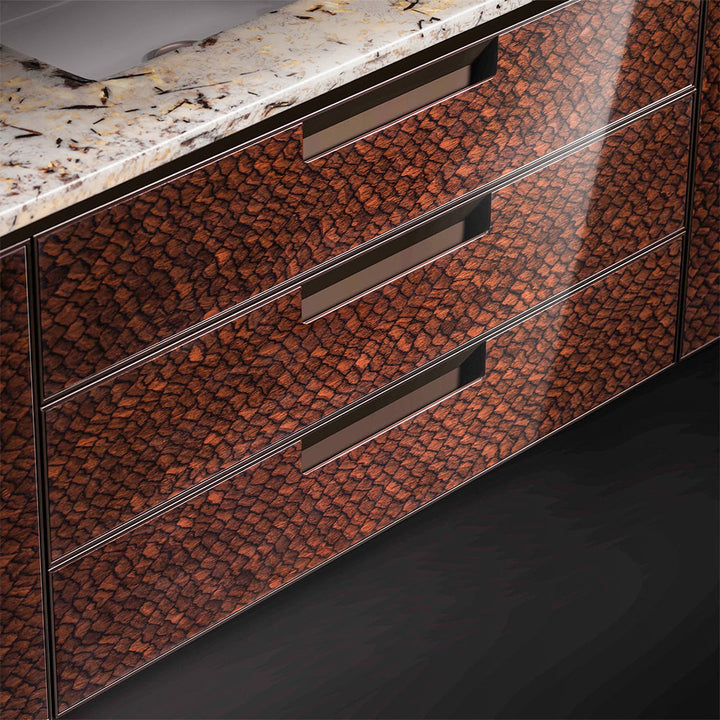 Close up of walnut custom bathroom vanity drawers with marble countertop