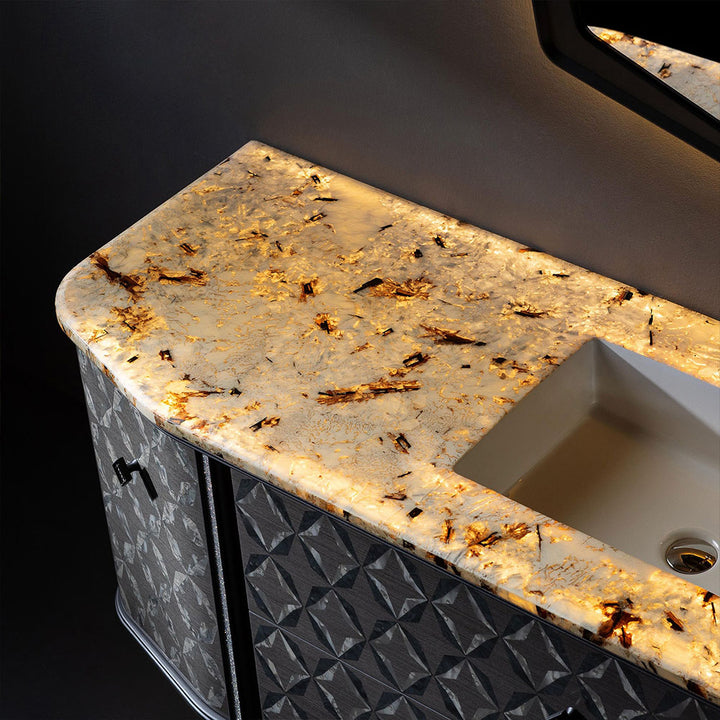 Custom bathroom vanity with lighted onyx countertop and luxury detail