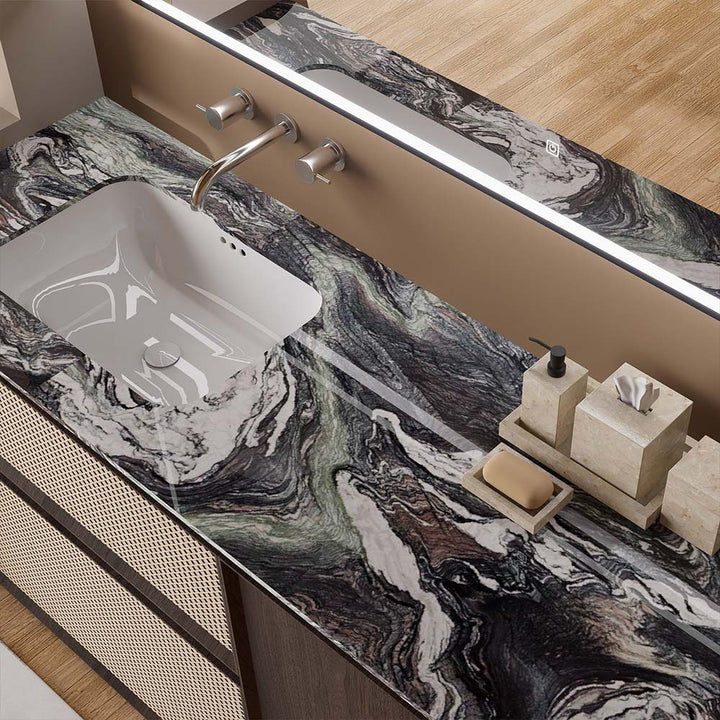 Marble countertop and undermount sink detail of custom bathroom vanity