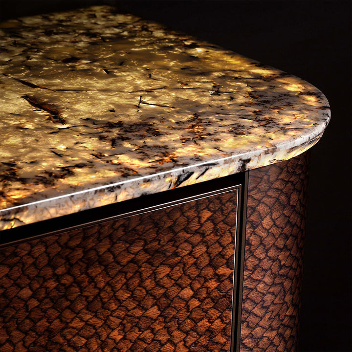 Close up of marble countertop and walnut wood detail on custom bathroom vanity