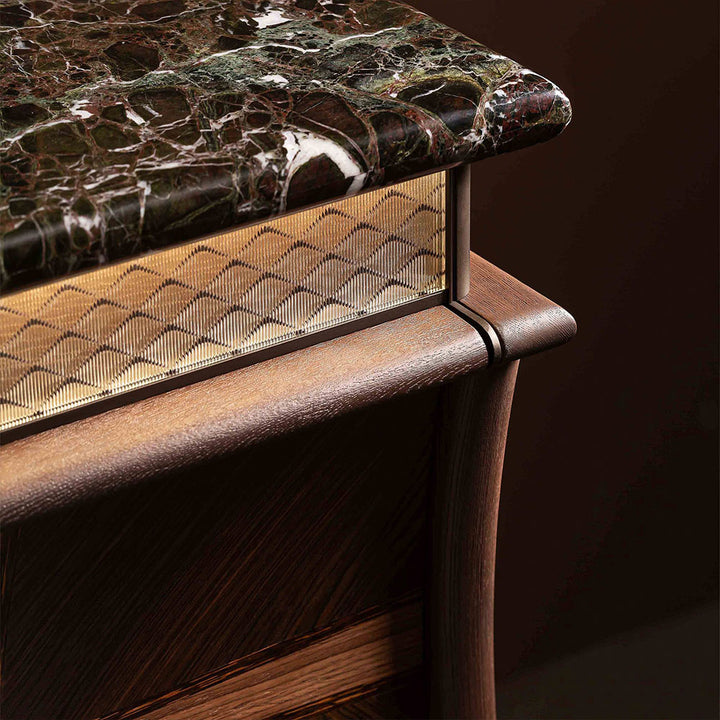 Custom bathroom vanity with marble top and metal trim detail