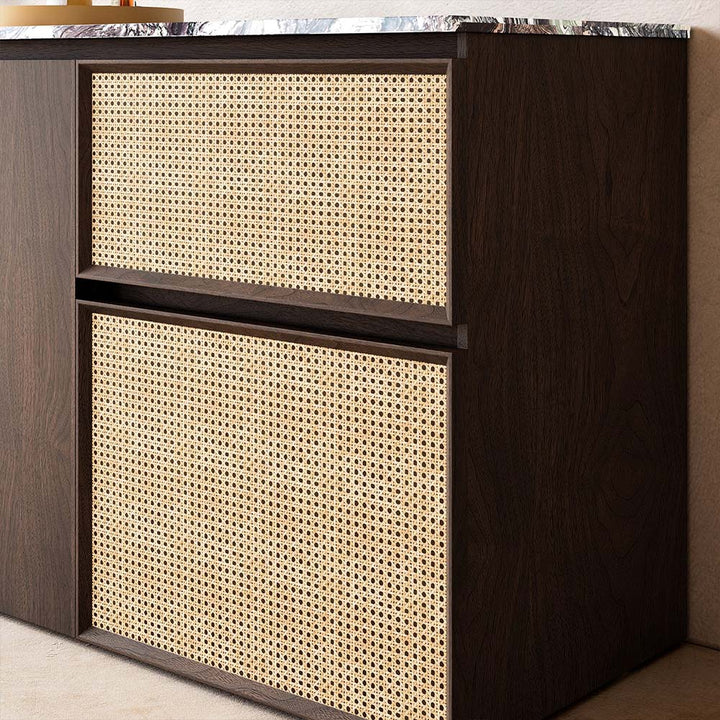 Closeup of rattan door and marble top on custom bathroom vanity