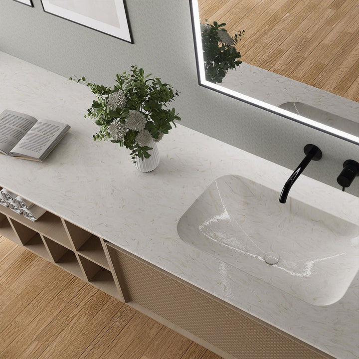Custom bathroom vanity with stone countertop and integrated sink top view