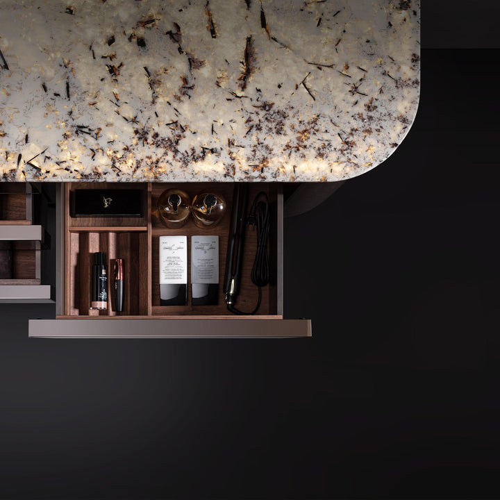 Top view of custom bathroom vanity with marble countertop and organized drawers