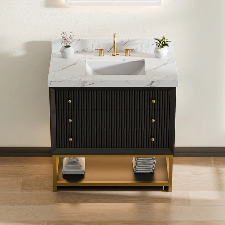 Fluted solid wood bathroom vanity with marble countertop and gold faucet