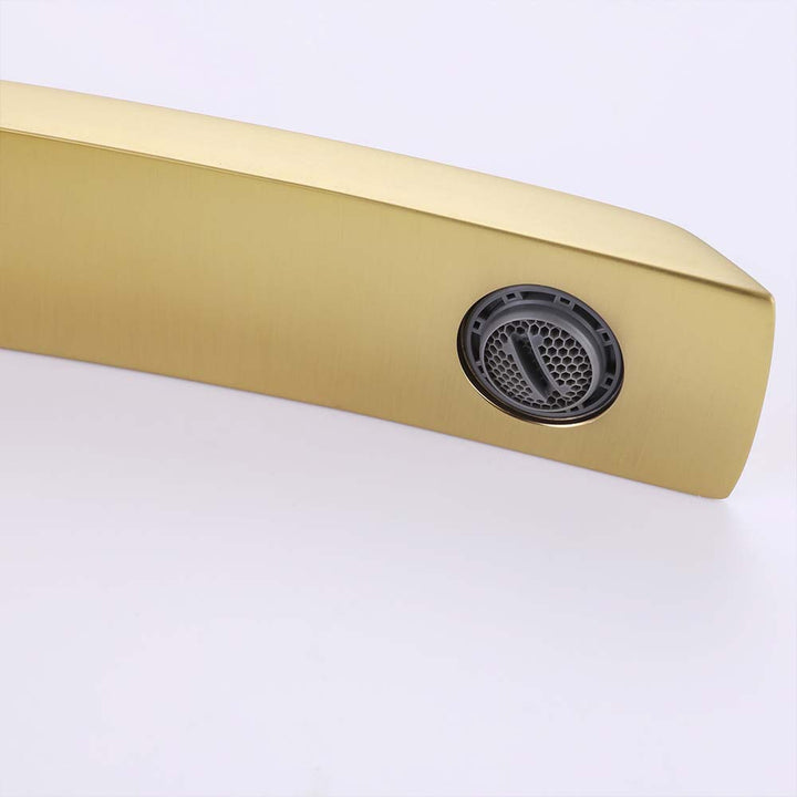 Close up of gold bathroom faucet aerator detail