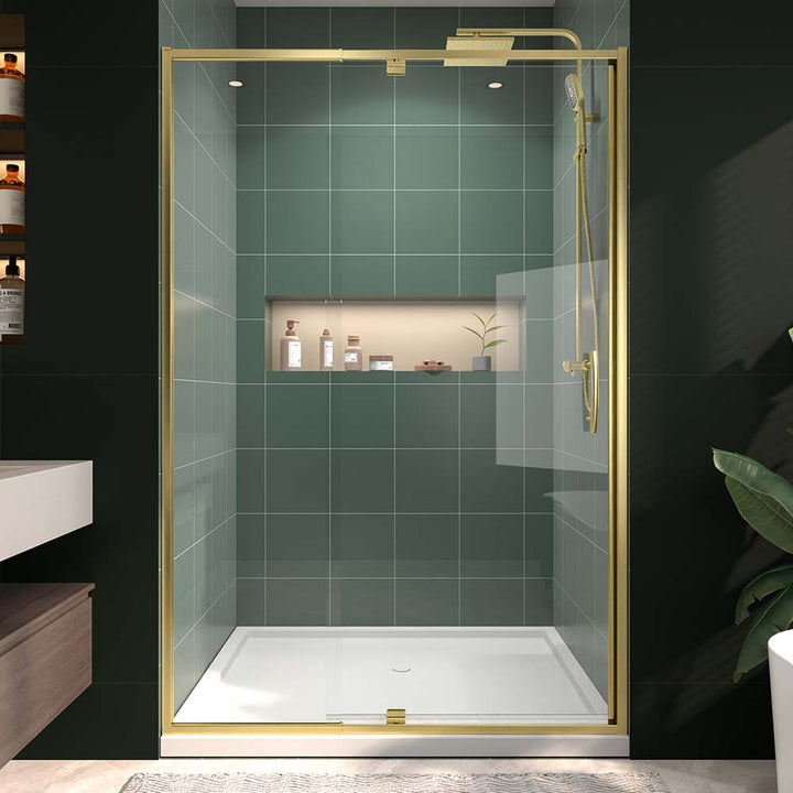 Front view of gold framed shower door in modern green bathroom
