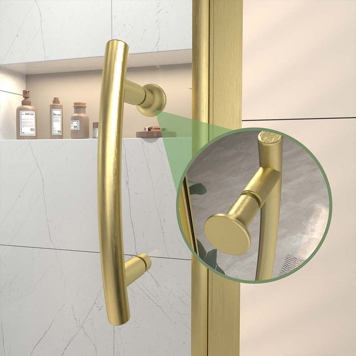 Gold shower door handle detail close up in modern bathroom