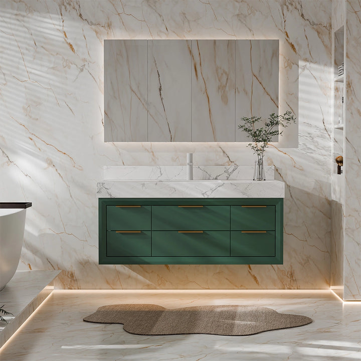 Green bathroom vanity with marble backsplash and led mirror