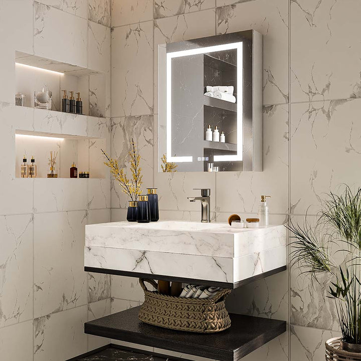 LED medicine cabinet with lighted mirror installed above marble vanity
