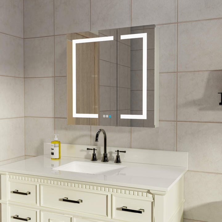 Modern lighted medicine cabinet with mirror in a bathroom