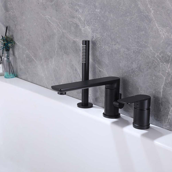 Installed matte black bathtub shower system with hand shower and faucet