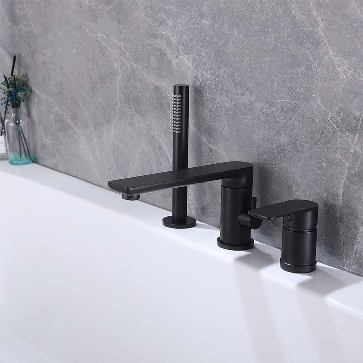 Installed matte black bathtub shower system with hand shower and faucet