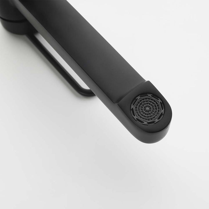 Close-up of matte black faucet aerator for water softening