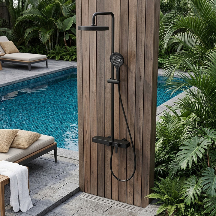 Matte black outdoor shower system poolside setting