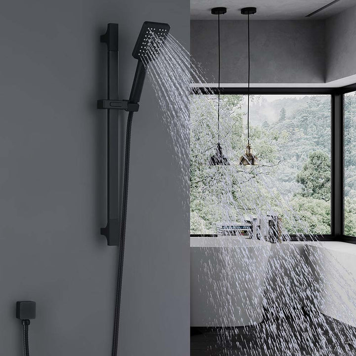 Matte black handheld shower spraying water in modern bathroom