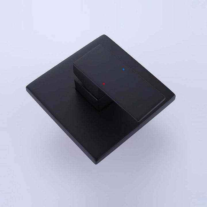 Matte black shower valve handle with hot and cold indicators