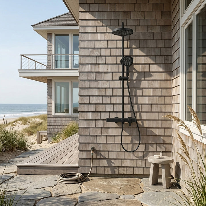 Matte black wall mounted outdoor shower with handheld sprayer