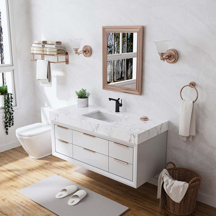 Black bathroom faucet on marble vanity with modern white cabinet