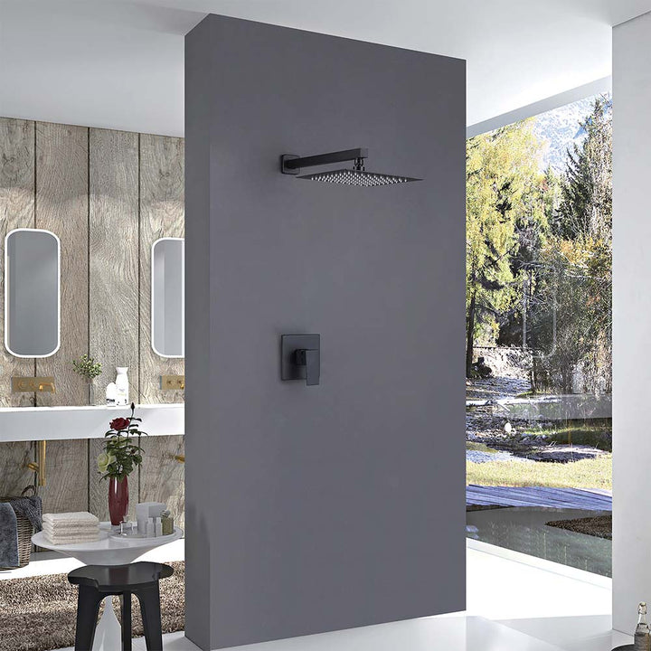 Wall-mounted matte black shower system in modern bathroom