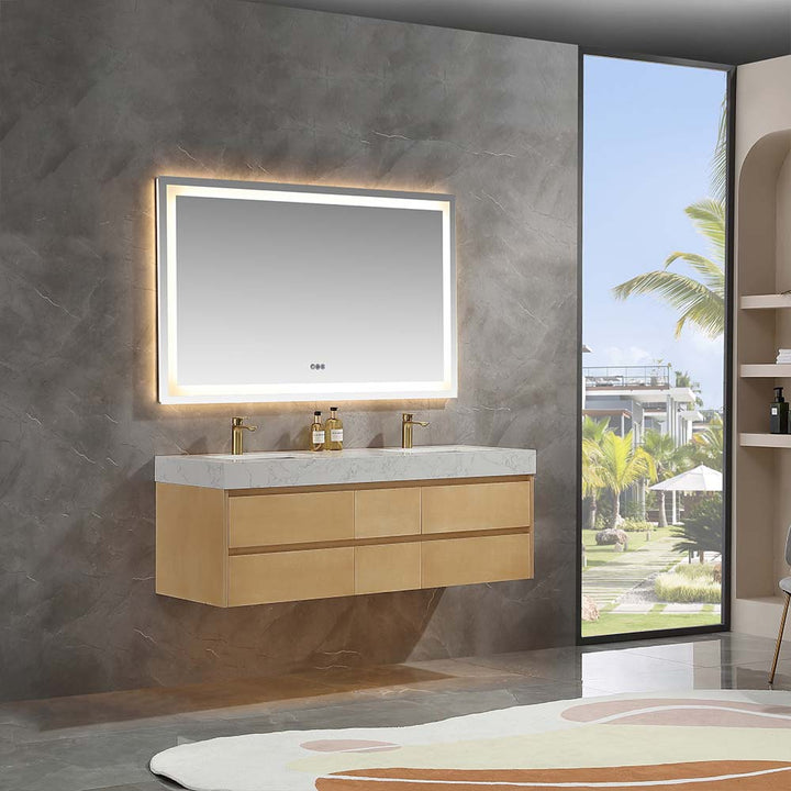 Modern floating bathroom vanity with marble countertop, dual sinks, and backlit mirror