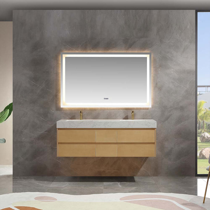 Modern floating vanity with marble countertop, dual sinks, and illuminated backlit mirror